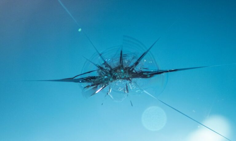 chip in windshield glass cracking and spreading and needing windshield chip repair Houston